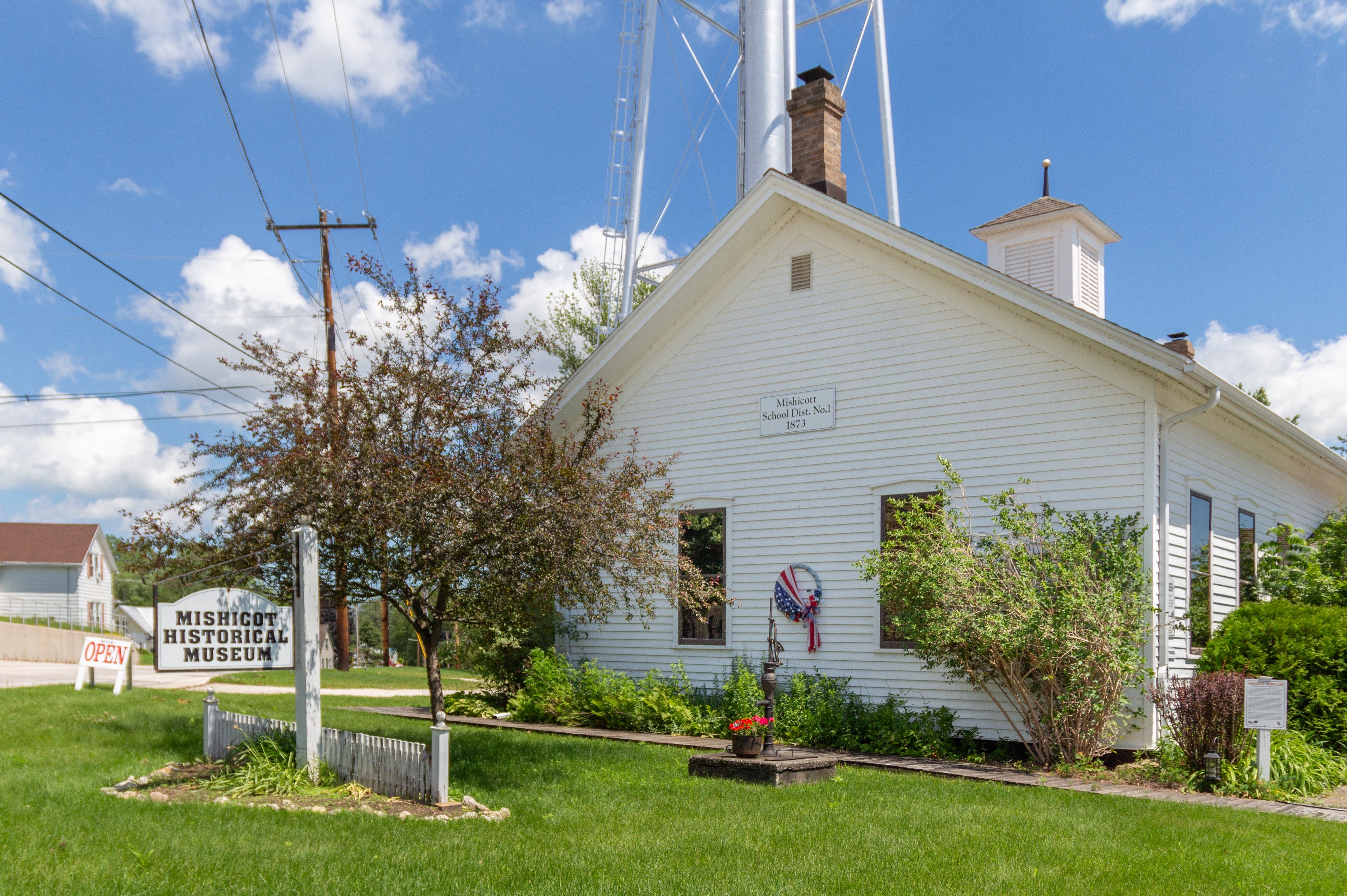 The welcome sign outside the Mishicot Historical Museum.